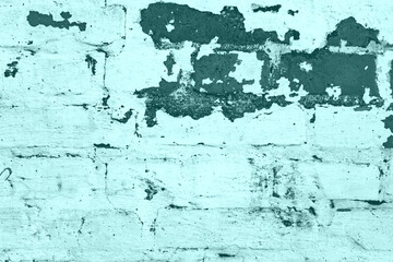 Texture of a brick wall with cracks and scratches which can be used as a background