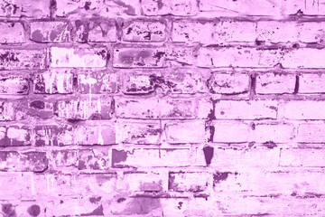 Texture of a brick wall with cracks and scratches which can be used as a background