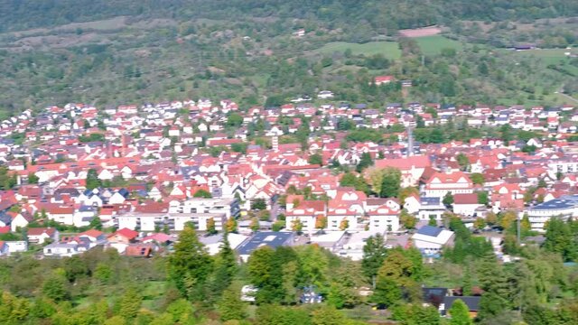 landscape top view, blurry panorama of the small European town of Dettingen, German village, houses, roads, trees, vineyards, vacation concept, travel, voyage, walk