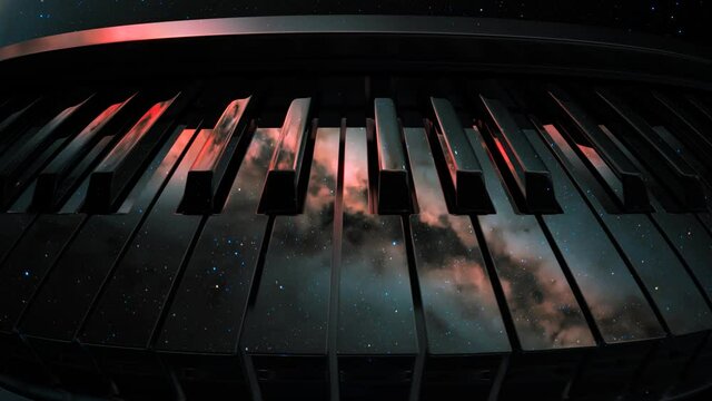 A glossy piano keyboard. Piano keys reflecting the night sky with the milky way.