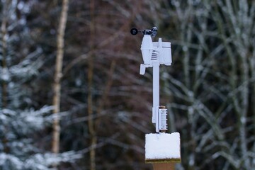 Small weather station near the forest.