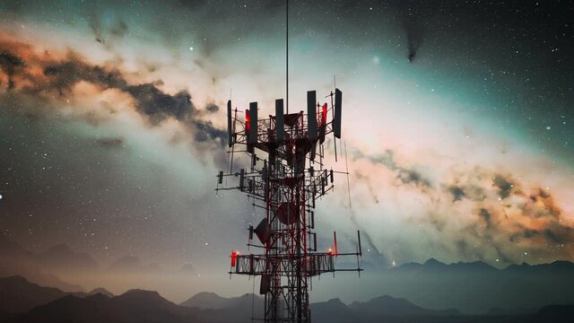 Camera spin around an antenna complex on a hill. Starry night in the mountains.
