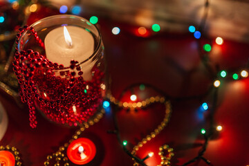 candle lights, red and gold decoration on red background