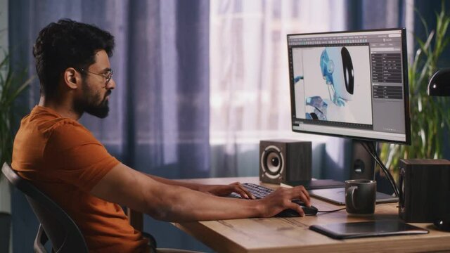 Indian man creating 3D model at home