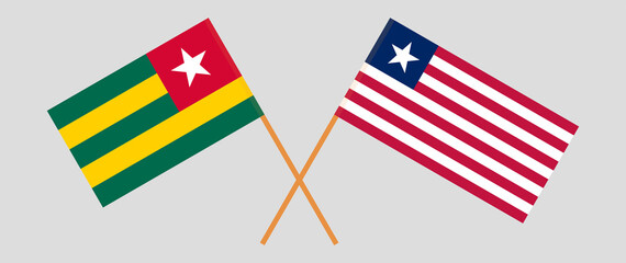 Crossed flags of Togo and Liberia. Official colors. Correct proportion
