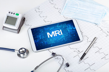 Close-up view of a tablet pc with medical abbreviation