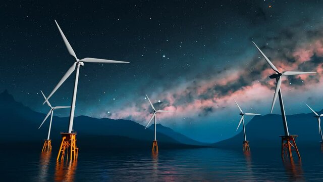 Offshore wind turbines spin around in the starry night marine background.
