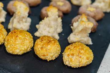 Close-up of panellets, a sweet food typical of All Saints' Day in Catalonia, Spain.