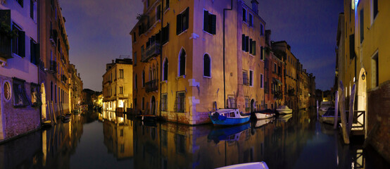 Panoramic picture of the canal in venice at night
