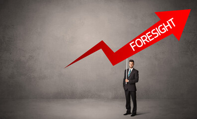 Young business person in casual holding road sign