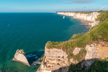 Fototapeta na wymiar Steep chalk cliffs of Etretat in Normandy, France