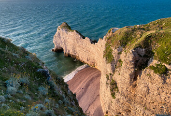 Steep chalk cliffs of Etretat in Normandy, France