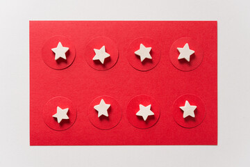 Fototapeta na wymiar wooden stars on red paper circles
