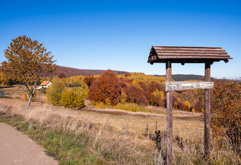 Colorful autumn landscape in a mountain village, morning on Golija Serbia