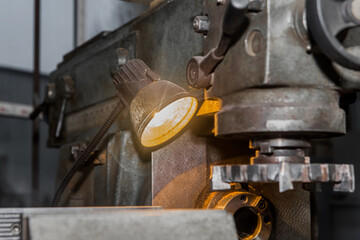 Industrial lighting element lamp for an old milling machine in the production hall