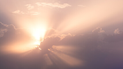 Fototapeta premium Wonderful view of cumulus clouds sky with orange sun light at sunset of summer