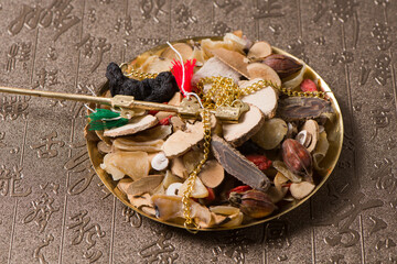 traditional Chinese medicine herbal on scales