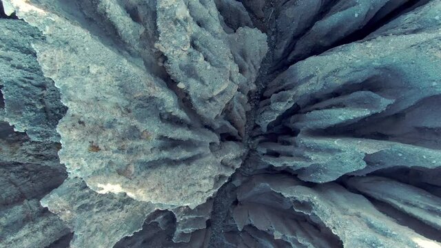 Aerial: Tightly packed cluster of ancient gravel spires at Putangirua Pinnacles, Cape Palliser, New Zealand