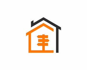 House with wooden arrow direction in the middle