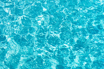 Tansparent clear calm water surface texture. Abstract nature background. Sea water pattern.