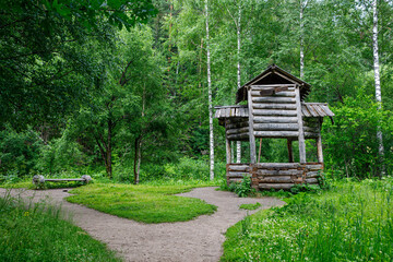 The wooden old mill is end of Terrenkur health trail along the Belokurikha mountain river in summer. Resort Belokurikha. Altay kray, Russia