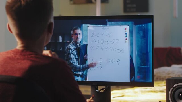 Teenager attending online math lesson