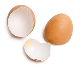 Top view group of broken eggshells stacked on white background.