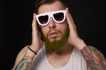 bearded macho man in white t-shirt sunglasses fashion tattoos