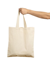 Hand Holding Beige Colour Canvas Tote Bag Isolated on White Background.