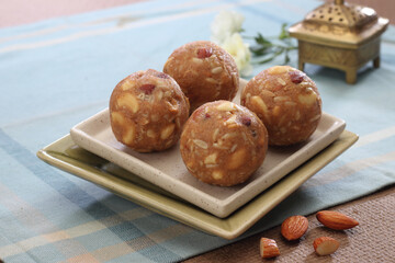 Indian Sweet Panjiri Laddu or pinni  in a platter. Specially popular in Punjabi Culture.