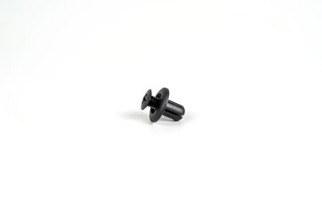 Plastic Black Clips For The Car. Close Up. Isolated On A White Background