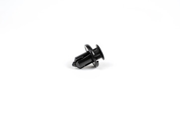 Plastic Black Clips For The Car. Close Up. Isolated On A White Background