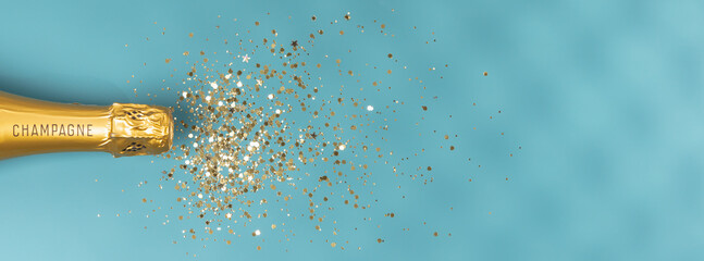 Bottle of champagne and confetti on pink background, top view. © Natalia Klenova