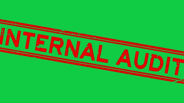 Grunge red internal audit word square rubber seal stamp zoom on green background