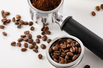 carob coffee machine tools, coffee beans, empty cups on white background, banner