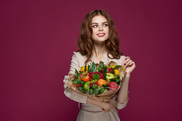 beautiful woman fun posing fruit bouquet vitamins isolated background