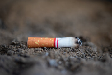 Cigarette burning from smoker addictive nicotine