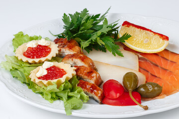 Image of dish with fish snack on white background