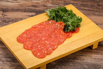 Italian spycy pepperoni sausage slices