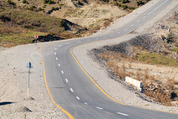 Turning on an asphalt mountain road