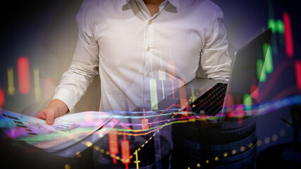 Young business man and digital number of stock market background to represent successful in investment marketing. Find out the best solution in business and financial as concept.	
