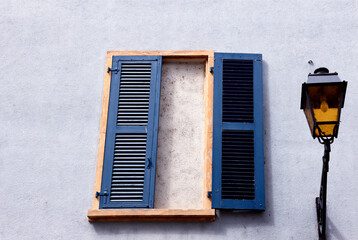 Facade with window shutters and lantern, historic part of Nyon, canton Vaud, VD, Romandy, Switzerland, Europe