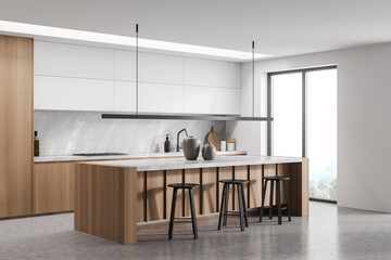 Breakfast bar and linear light in minimalist white and grey kitchen - obrazy, fototapety, plakaty