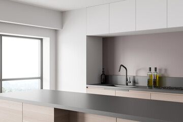 Corner view on bright kitchen room interior with white wall
