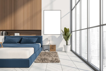 Mockup canvas near window in modern white and blue bedroom