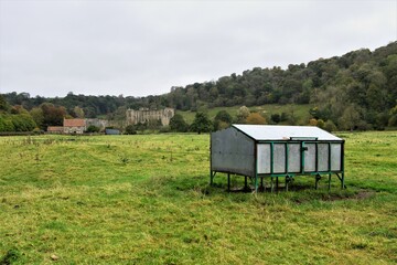 Long distanced farm view, of Rievaulx village and abbey, in autumn.