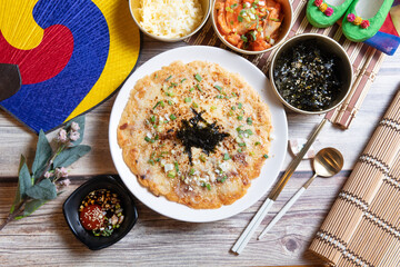 A kimchi pancake with seafood and cheese, Cheese Seafood Pajeon （Korean Pancake）