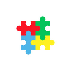 Four colorful pieces of a jigsaw puzzle