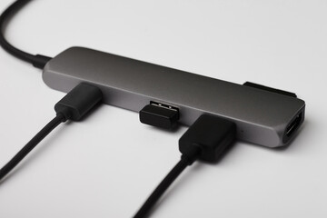 Close-up photo of type-c hub with cables and a bluetooth reciver