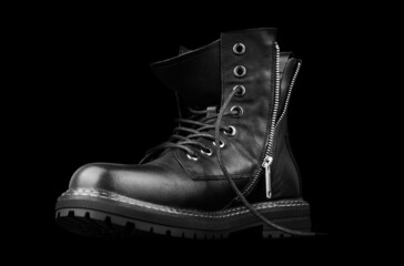 Black shoe, isolated on a black background